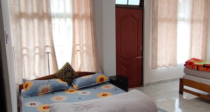 Divine Homestay Room Type - 102