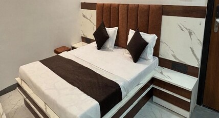 HOTEL SHREE ASHTVINAYAK GRAND Room Type - DELUXE AC ROOM