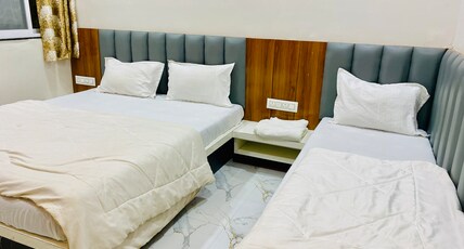 Maa Narmada Hotel & Family Restaurant Room Type - Deluxe Triple Room