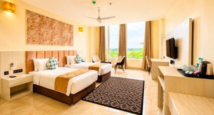 YASHSHREE NAMDANG PREMIER HOTEL & BANQUET Room Type - Premium Twin
