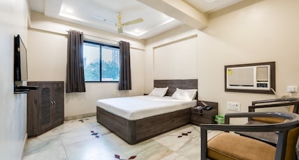 Hotel Pride Room Type - Deluxe AC Room Hotel Pride Room Type - Deluxe AC Room