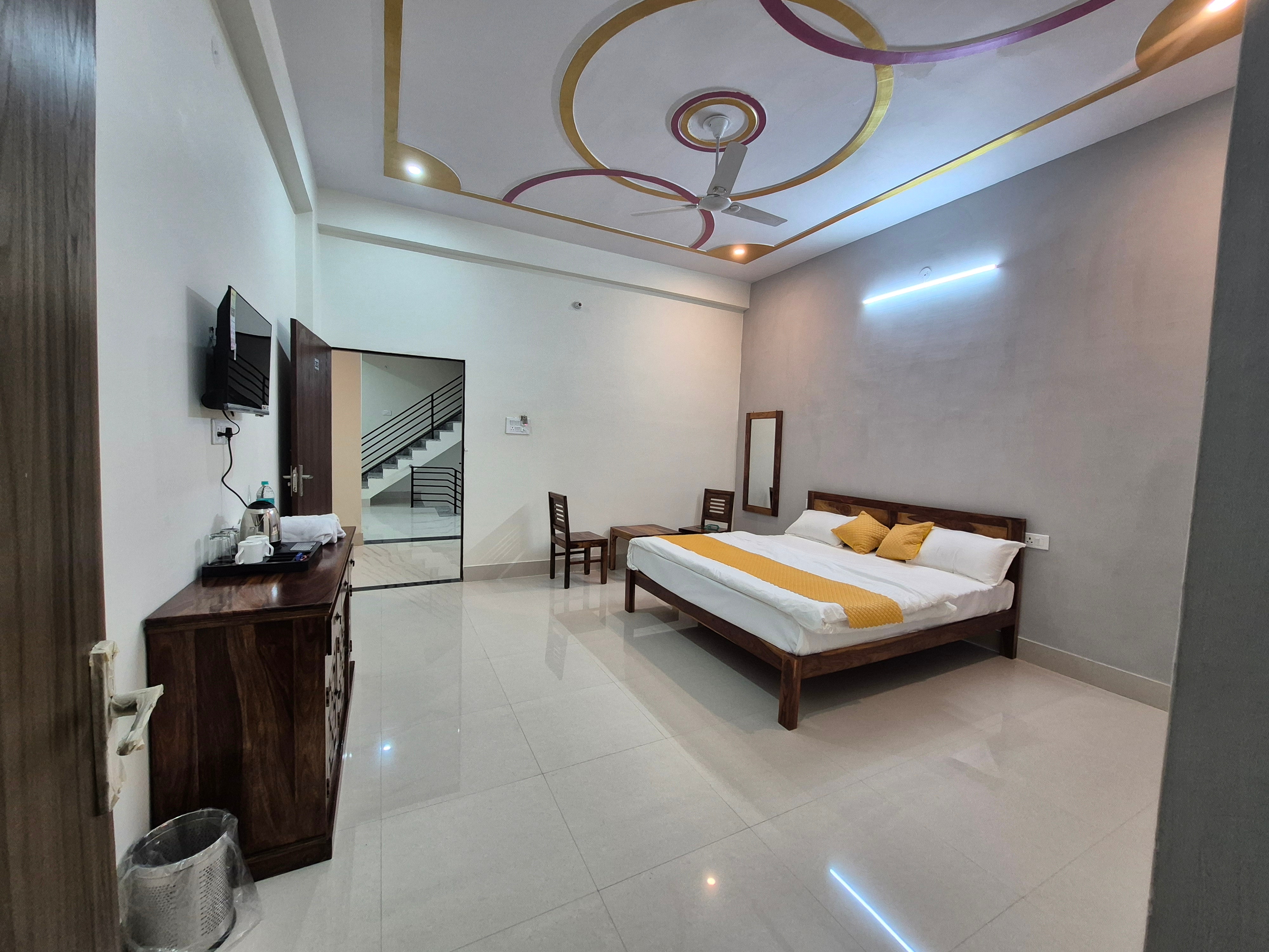 Hotel Om Sai - Tap to explore photos