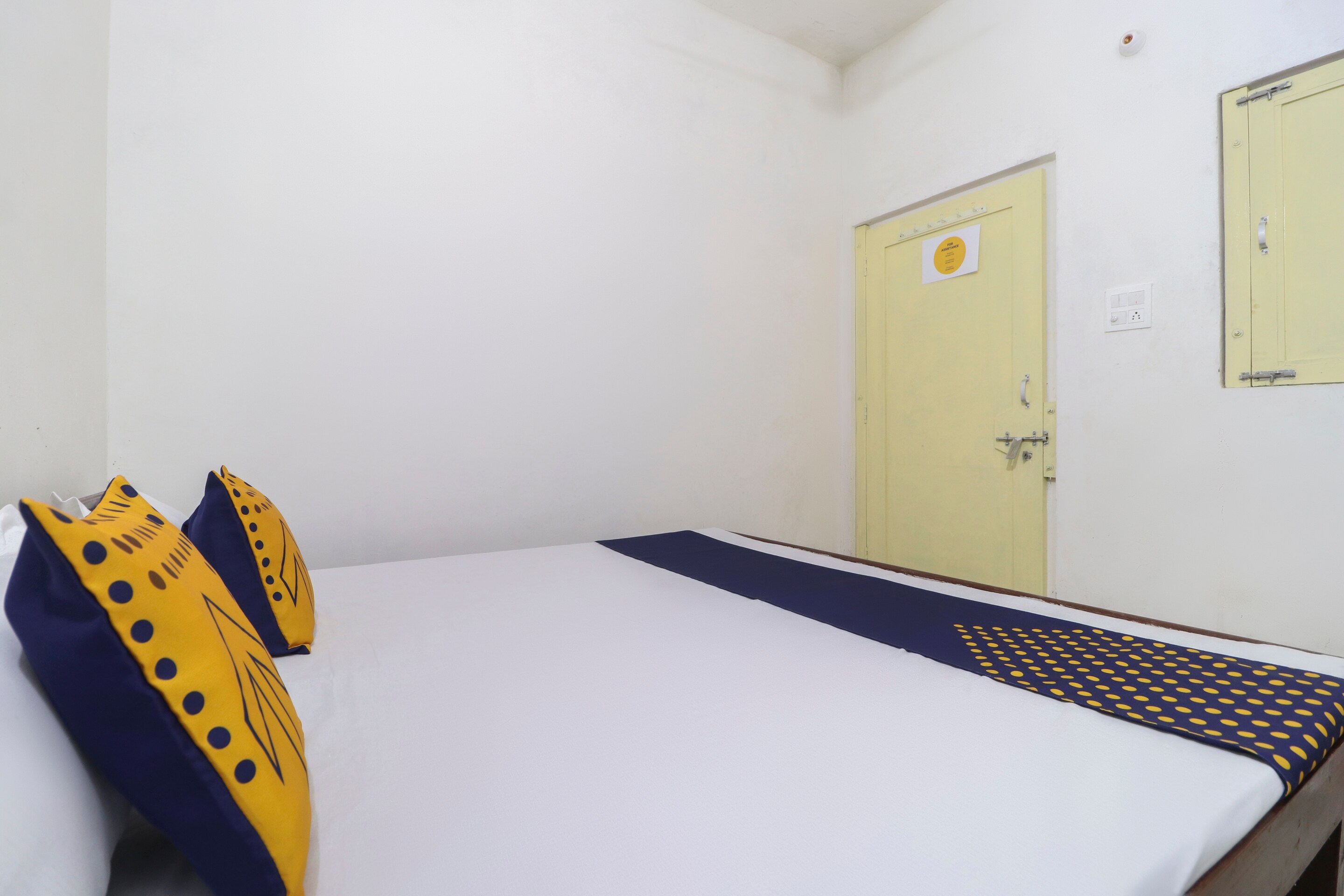 Hotel O MCK Rooms - Tap to explore photos