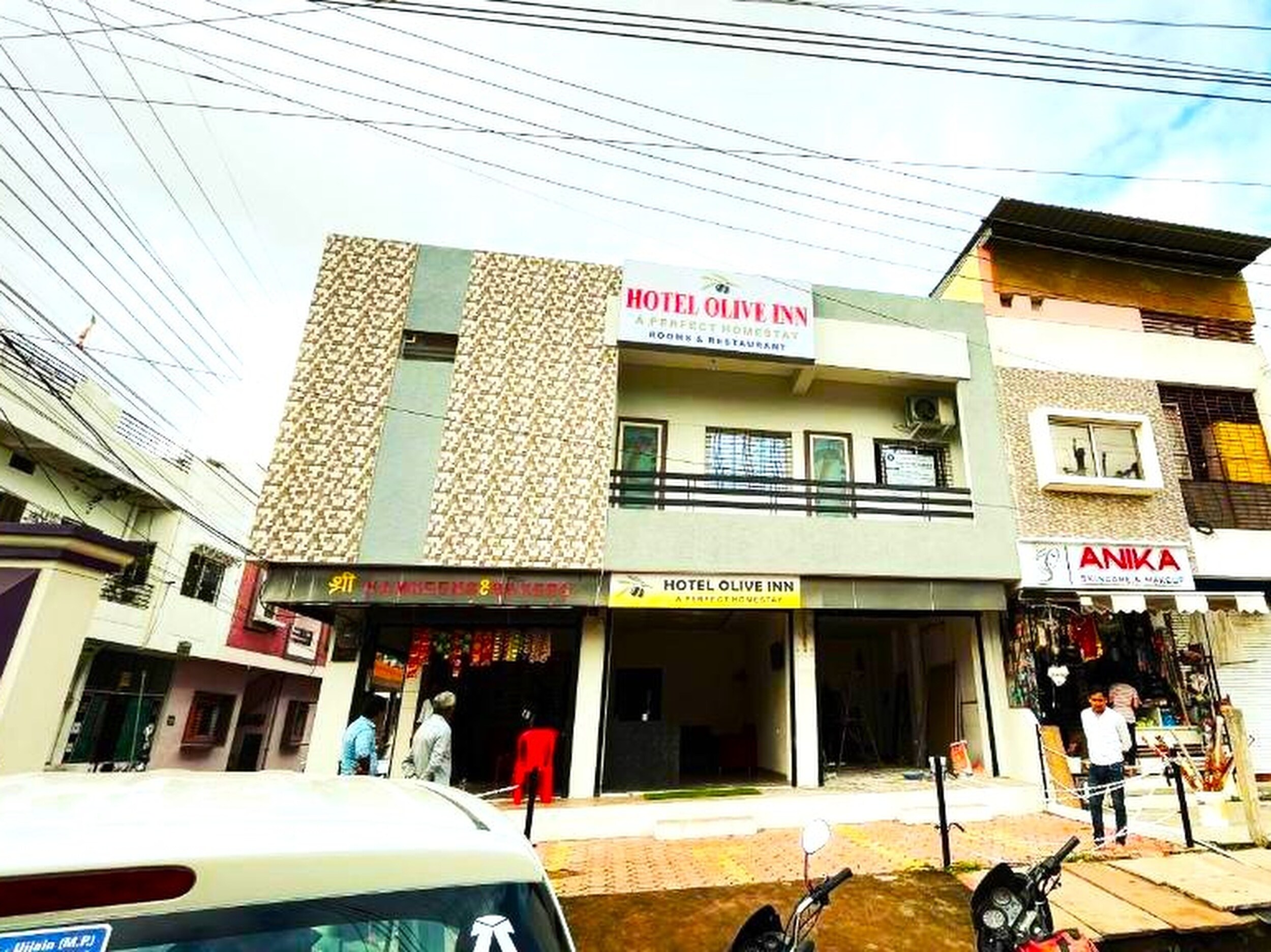 Hotel Olive Inn - Tap to explore photos