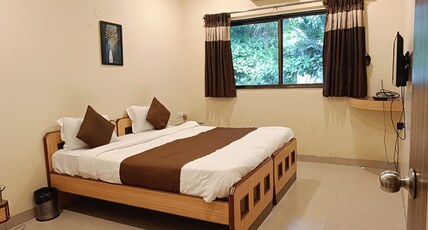 Aquarius Resort Room Type - Deluxe AC Room