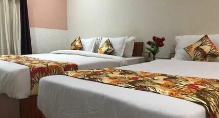 Hotel Minakshi International Room Type - Deluxe room