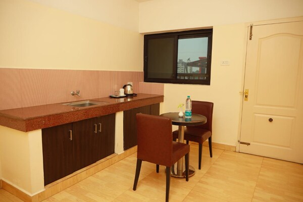Tayas - Rooms and Suites - Tap to explore photos