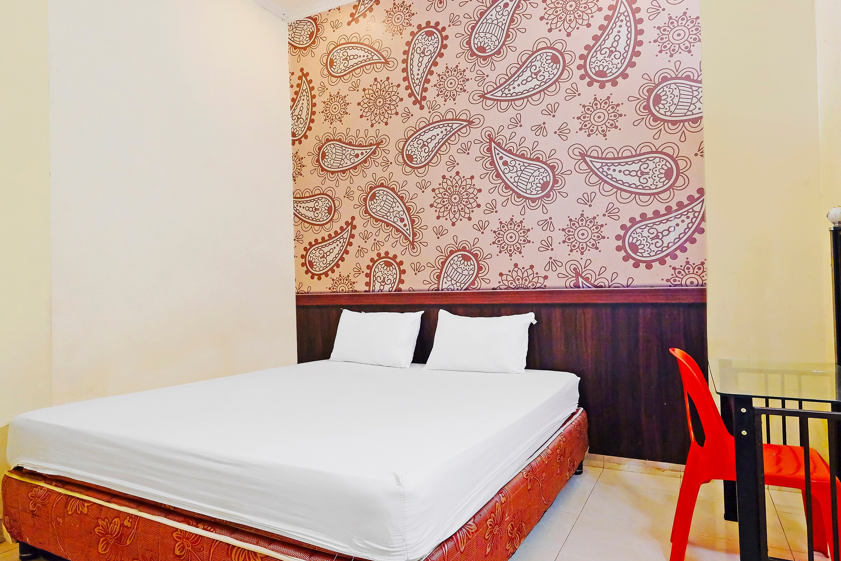 Hotel O Wisma Idola Palopo - Tap to explore photos