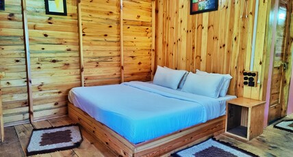 Mid Conifer | Resort & Cottages Room Type - Deluxe cottage ( Snow Capped Mountains View )