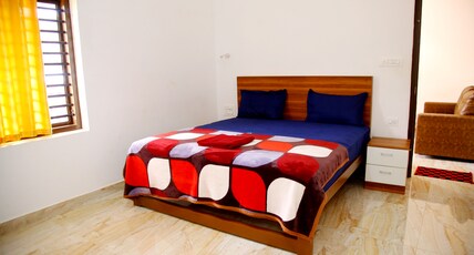 Peacock Ranipuram Resort Room Type - Deluxe cottage With Balcony
