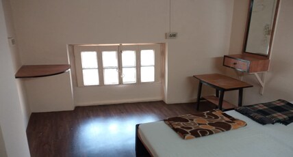 Continental Guest House Room Type - Non AC Double with Shared Bathroom (Bathroom one floor below) Continental Guest House Room Type - Non AC Double with Shared Bathroom (Bathroom one floor below)
