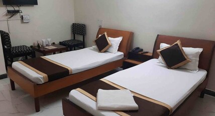 Hotel Rajhans International  Room Type - AC Standard Room