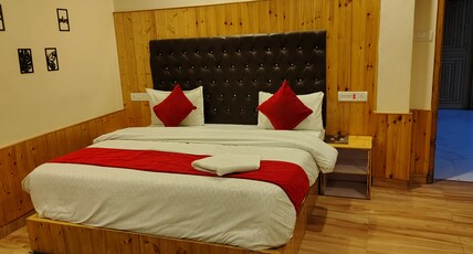 Zip To Himalayas Room Type - Deluxe Room with Balcony mountain view
