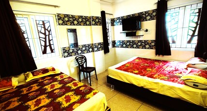 Suriya lodge Room Type - Four Bed Deluxe Room