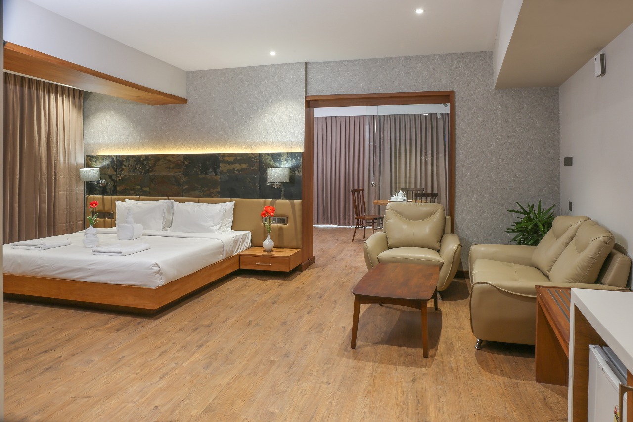 Welcare Business Hotel - Tap to explore photos