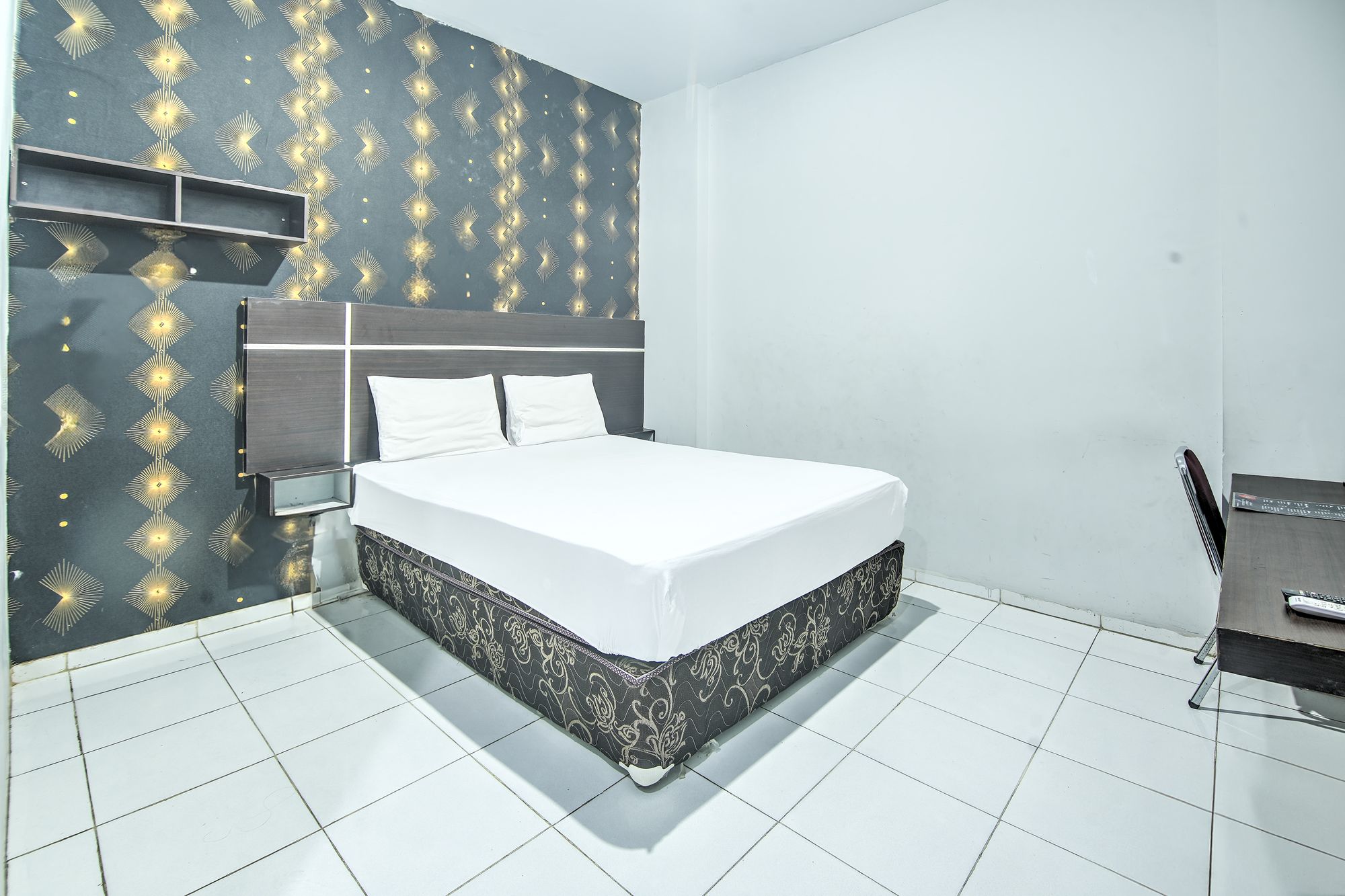 Hotel O Makassar near Mall Panakukang formerly Hotel Lucky Inn Makassar - Tap to explore photos