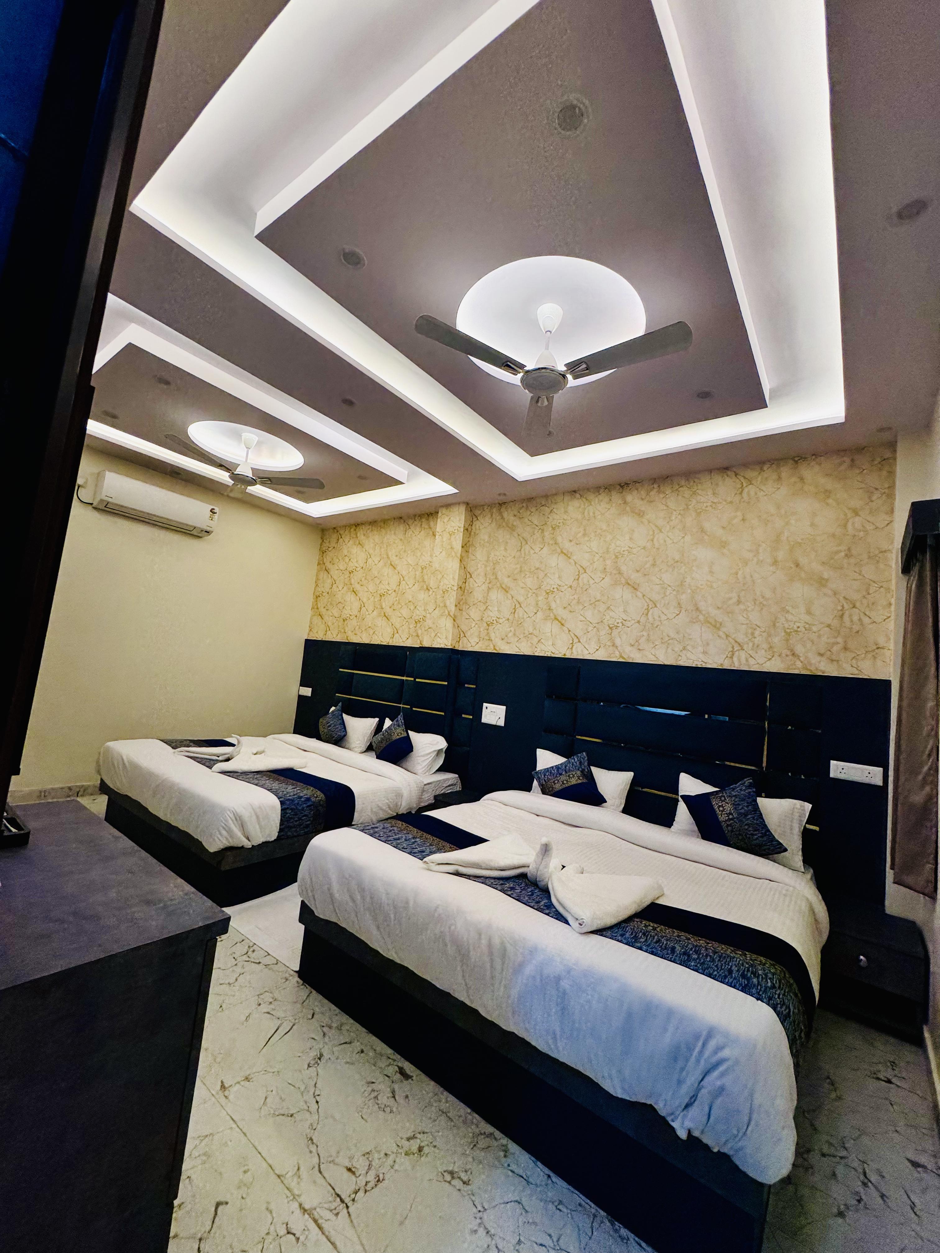 KashVi Hotels - Tap to explore photos