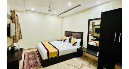 Hotel M K Grand Near Kashi Vishwanath Temple Room Type - Deluxe AC Room