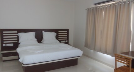 HOTEL AJANTA GREEN RESTAURANT & RESORT Room Type - DELUXE  AC ROOM