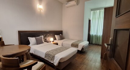 Hotel Tragopan Room Type - Premium Twin Bed AC Room