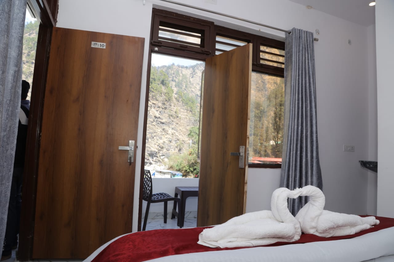 Hotel Mahadev - Tap to explore photos