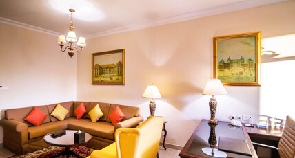 Mercure Dubai Barsha Heights Hotel Suites And Apartments Room Type - Family Two Bedroom Apartment with a king size bed and 2 single beds, City View