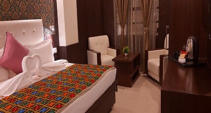 Hotel Ganga Aatitheyam Room Type - Deluxe Room (Garden View)
