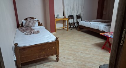 Badalin Travellers Inn Homestay Room Type - Triple Sharing Room