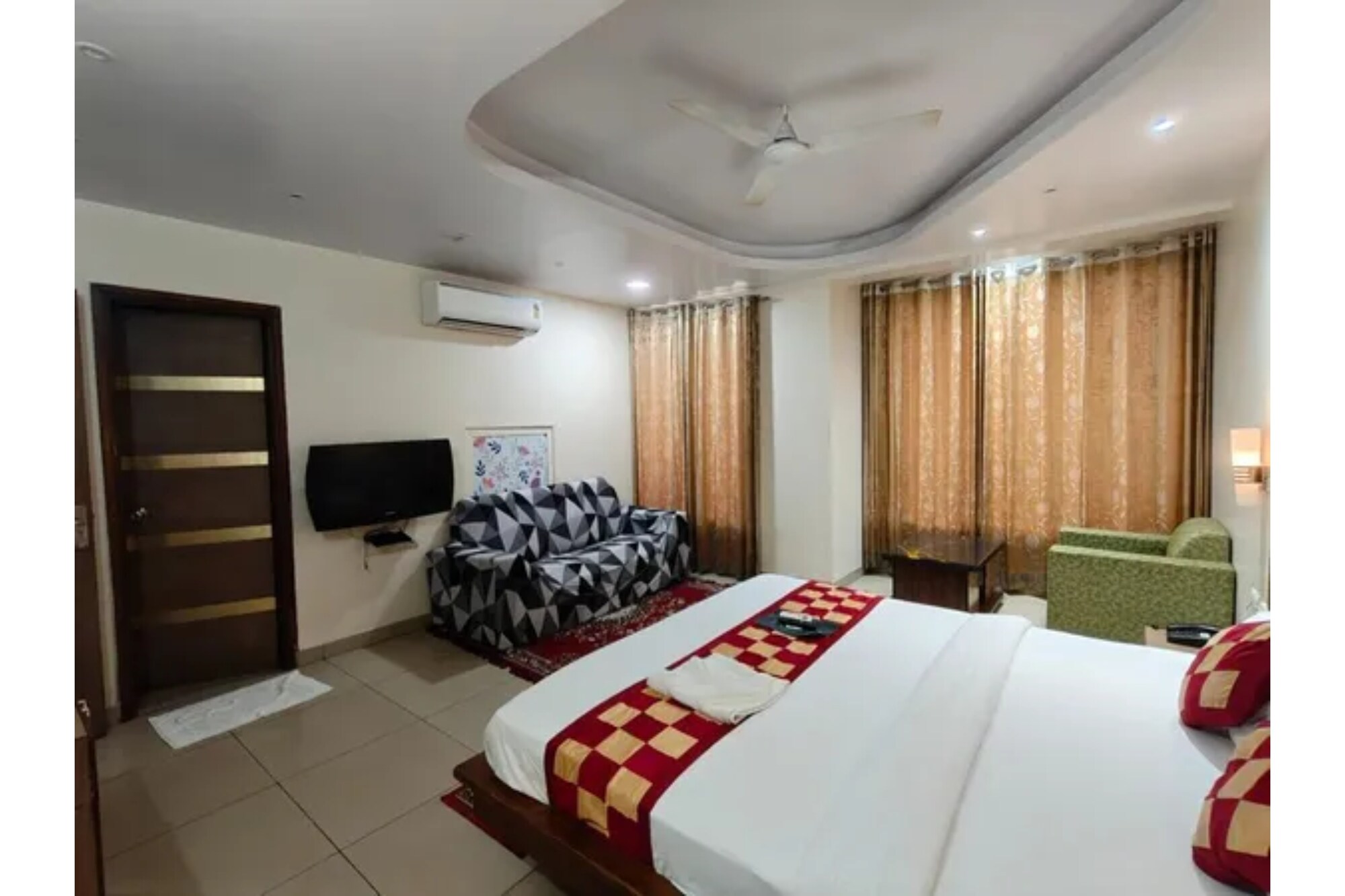 FabHotel Satyam Inn - Tap to explore photos