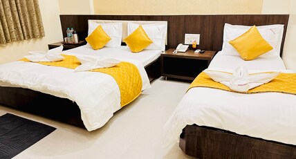 Hotel Sai Gurusthan Room Type - Deluxe Triple Bed Non AC