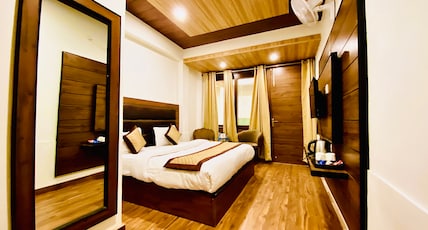Hotel Woodland(walkable Distance from Mall Road) Room Type - Premium Room Hotel Woodland(walkable Distance from Mall Road) Room Type - Premium Room