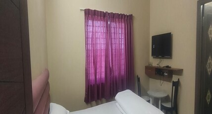 JVM Inn Room Type - Premium Twin Bed AC