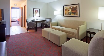 Holiday Inn Express & Suites Bloomington West Room Type - 1 King Bed Suite Sofa Bed