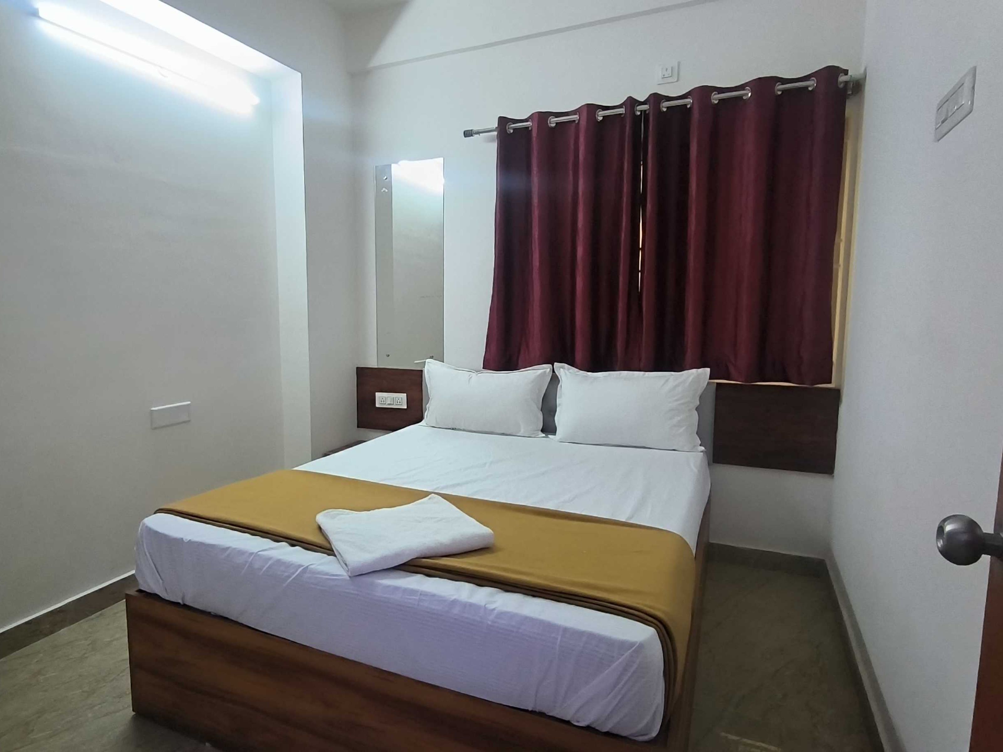 HOTEL O AISHWARYA COMFORT - Tap to explore photos