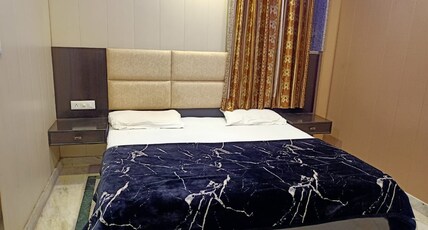 Hotel Ganpati Plaza Room Type - Standard Double Bed With Parking facility.