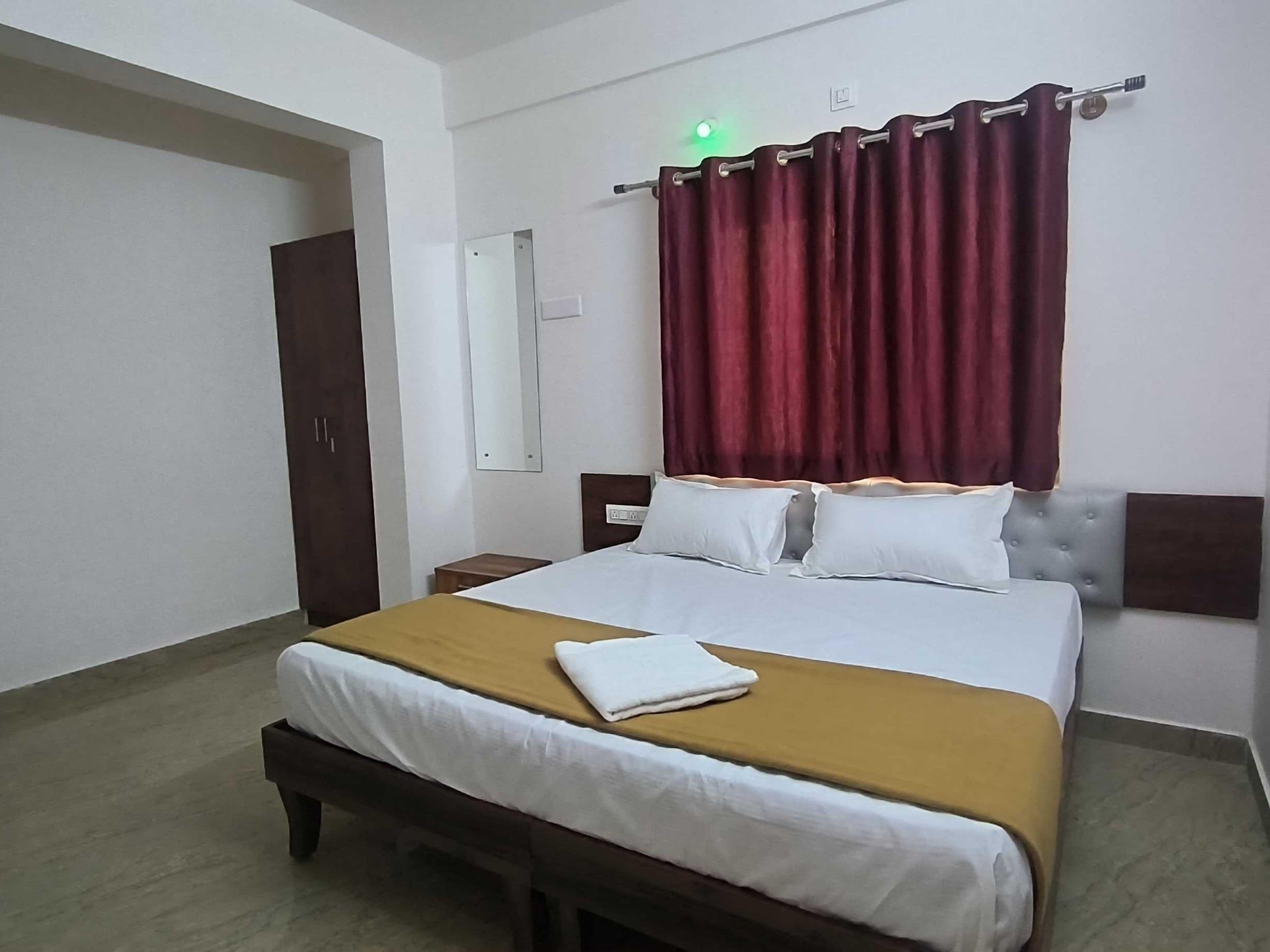 HOTEL O AISHWARYA COMFORT - Tap to explore photos