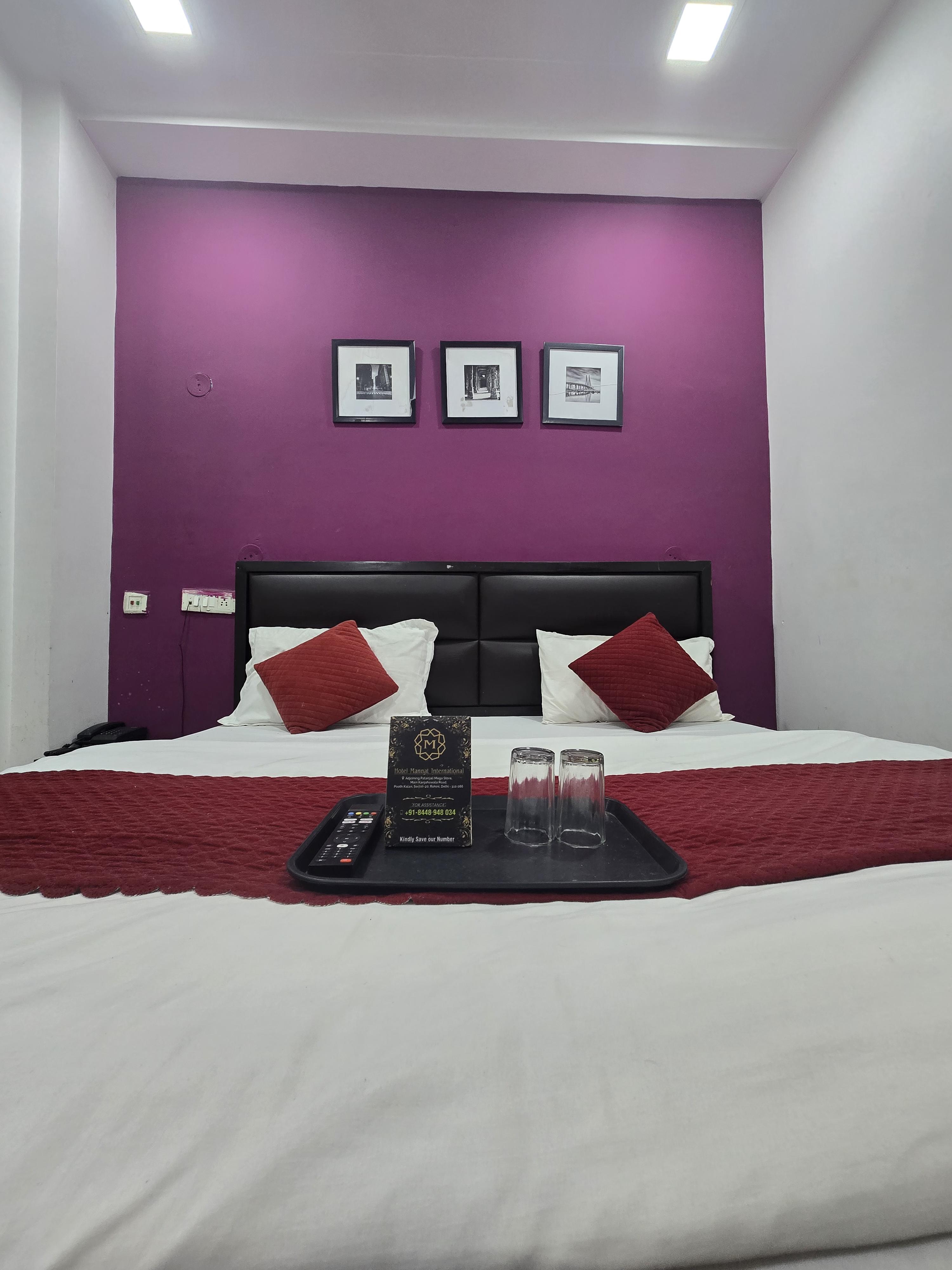 Hotel Mannat Stays Budh Vihar, Delhi - Tap to explore photos
