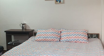 Trushali Homestay Room Type - Deluxe room