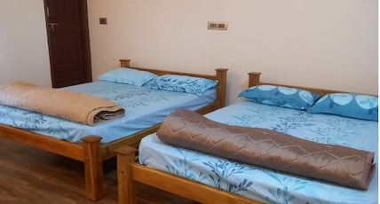 Coffee Mist Homestay | Rooms & Caretaker Room Type - Deluxe Non AC room Coffee Mist Homestay | Rooms & Caretaker Room Type - Deluxe Non AC room