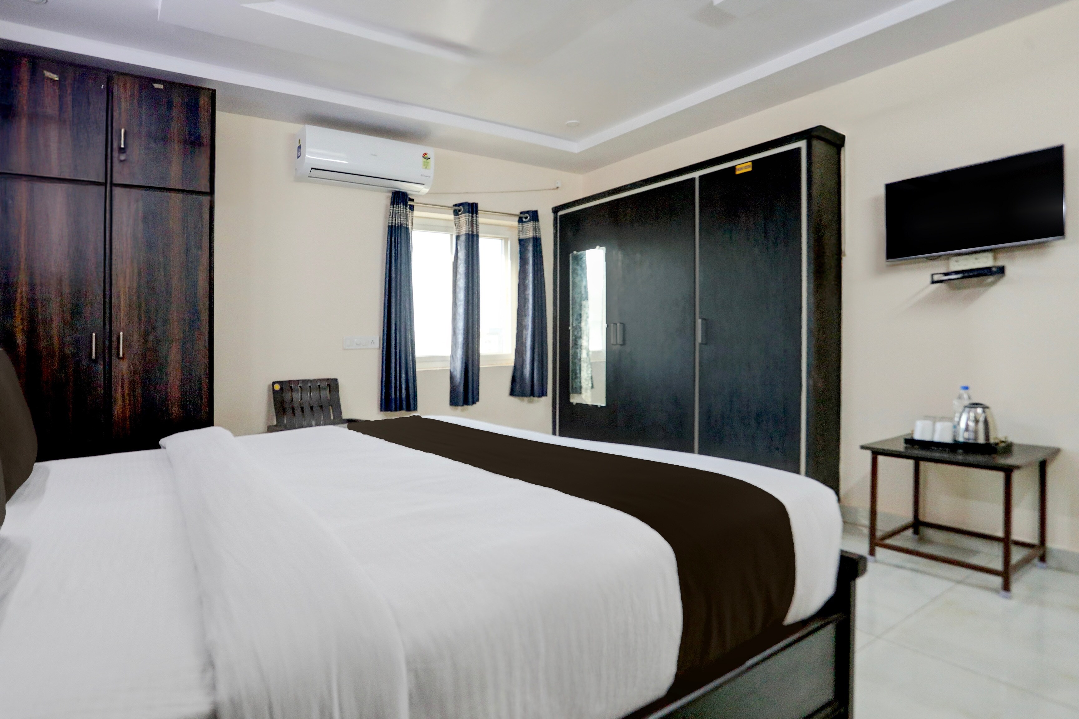 Hotel O COASTAL SUITES - Tap to explore photos