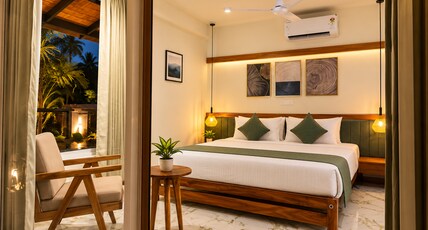 Bhoomi by Ostello Room Type - Room 103: Deluxe King Room with Garden View.