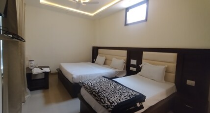 G L PALACE Room Type - Three Bed Ac Room