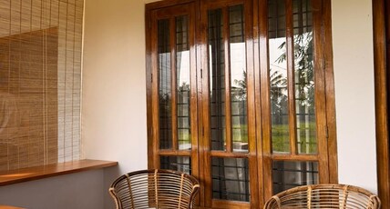 Bhoomi by Ostello Room Type - Room 101: King Room with Garden View and Patio.