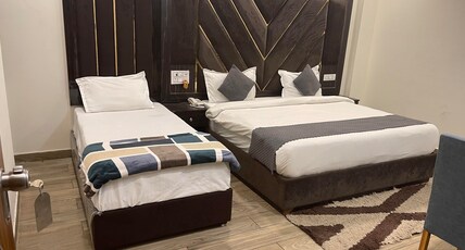 Hotel Shreya Galaxy Room Type - Triple Bed Family Room