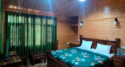 PINE WOOD NIRVANA Room Type - Deluxe Pinewood Cottages