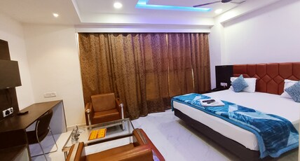 FLOWERS INN Room Type - Deluxe Room