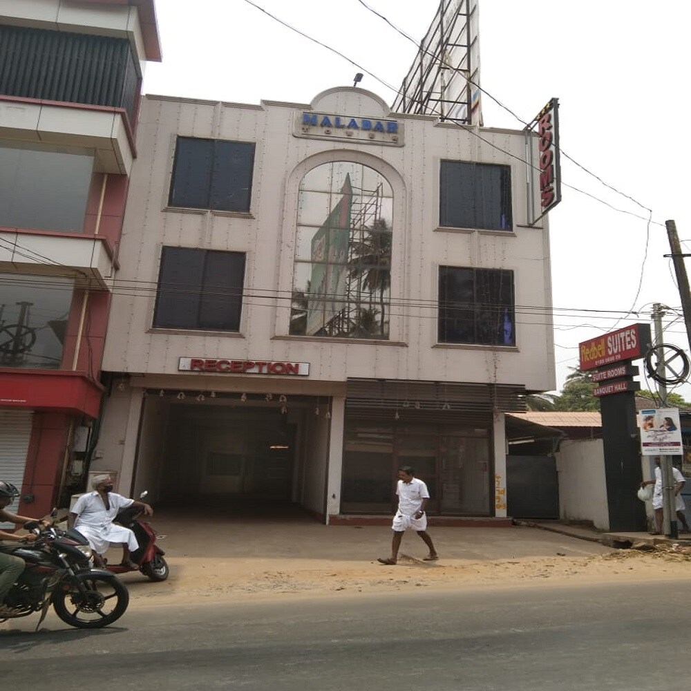 Redbell Suites Manjeri - Tap to explore photos