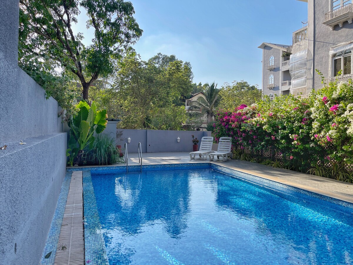 Casa Rio - Stylish 1BHK with Common Pool in Siolim | Hireavilla - Tap to explore photos