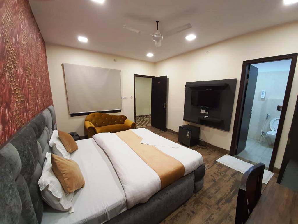 Hotel Mandakini Royale - Tap to explore photos
