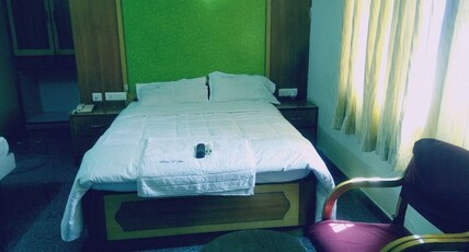 Hotel V- Inn Room Type - Standard Non AC Room Hotel V- Inn Room Type - Standard Non AC Room